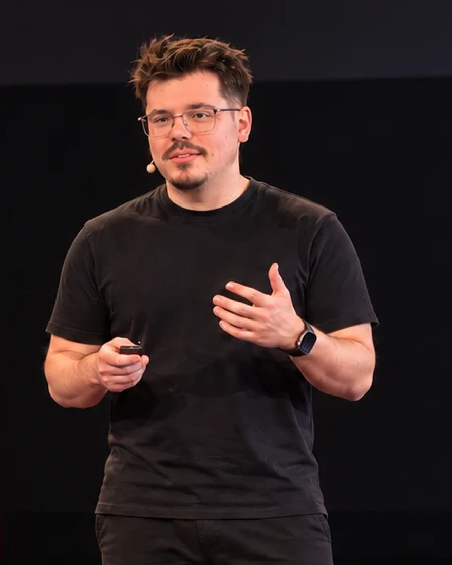 Gian Stocco speaking on stage
